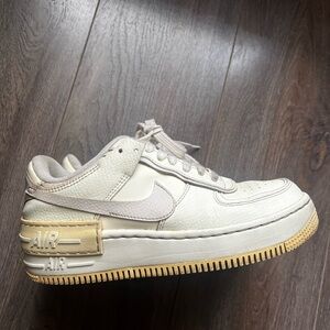 Nike Air Force 1 Low Cream and Tan Sneakers